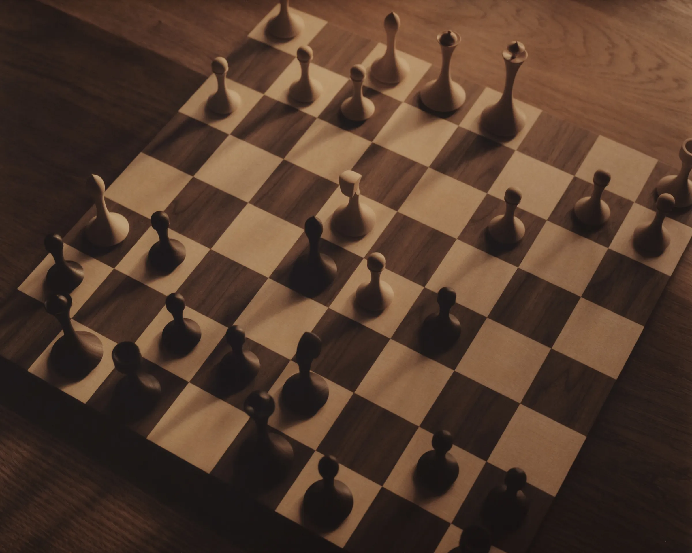 Medium format film frame of Paul Joshua's handmade chess board from above, Hasselblad 500CM, printed by hand by Filip Gielda