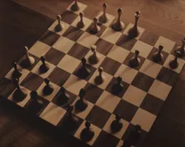 Medium format film frame of Paul Joshua's handmade chess board from above, Hasselblad 500CM, printed by hand by Filip Gielda