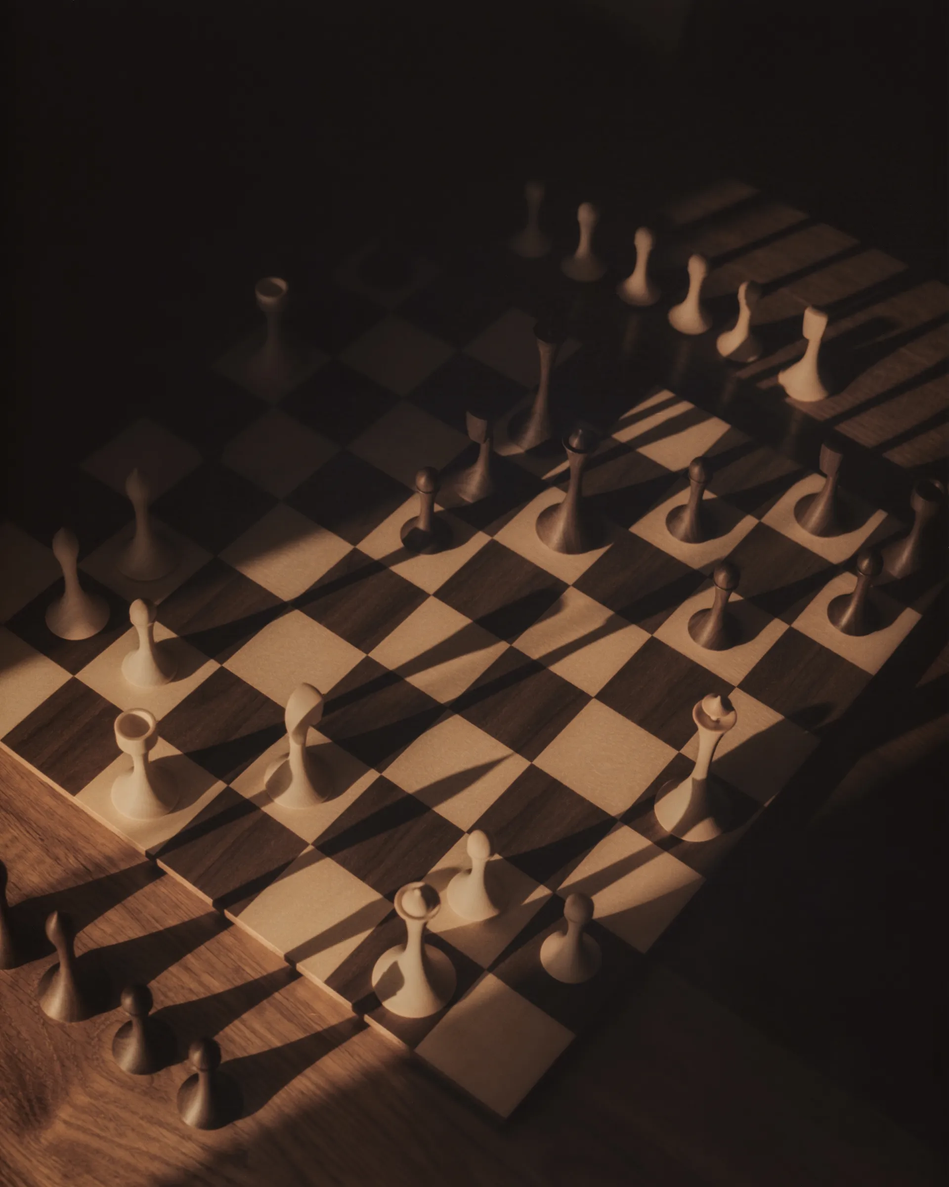 Hand-printed darkroom photograph of Paul Joshua's chess board in evening light, shot on medium format film with a Hasselblad 500CM